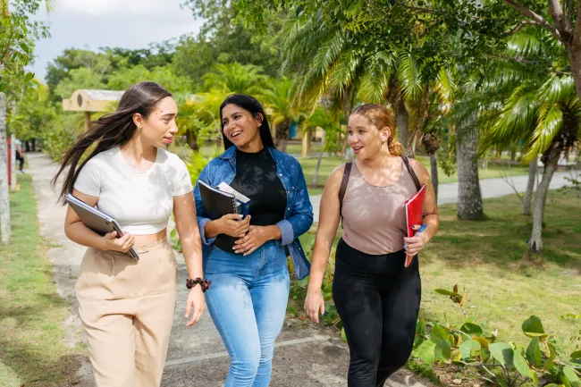 student strolling around campus